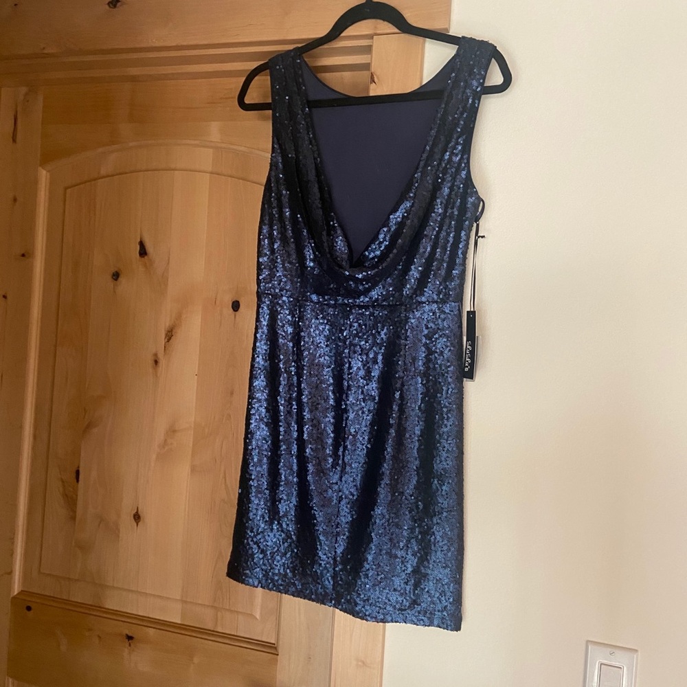 Navy blue sequin cowl back boat neck mini dress.